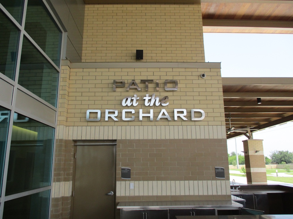 patio at the orchard sign